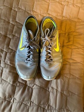 Nike Gray Sneakers with Neon Yellow Swoosh